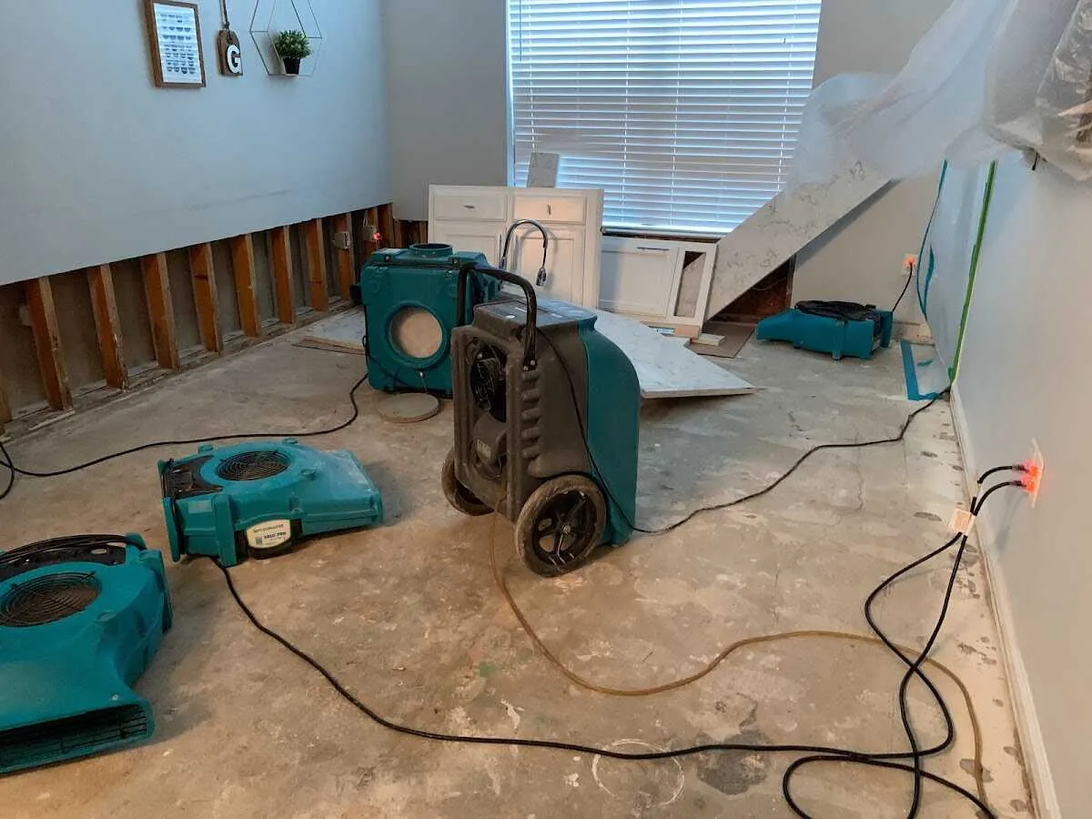 Dehumidifier in flood-cut room for Water Damage Restoration in Deerfield Beach